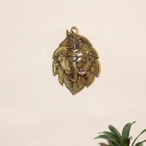 Brass Vinayaka on Leaf Wall Hanging