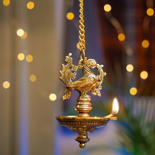 Peacock Holding Diya